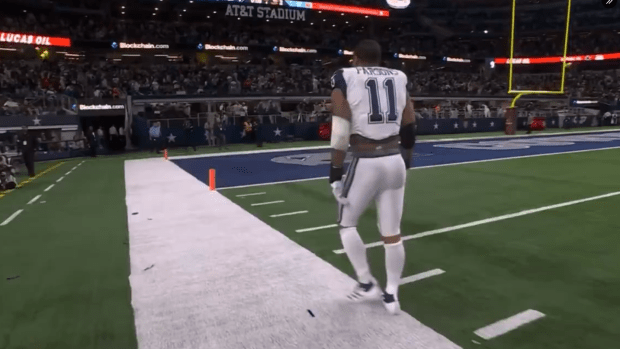 Dallas Cowboys' Micah Parsons walks off the field vs. Cincinnati Bengals in Week 14.