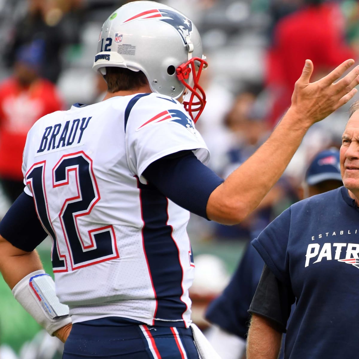 Tom Brady does a cool gesture for his former high school