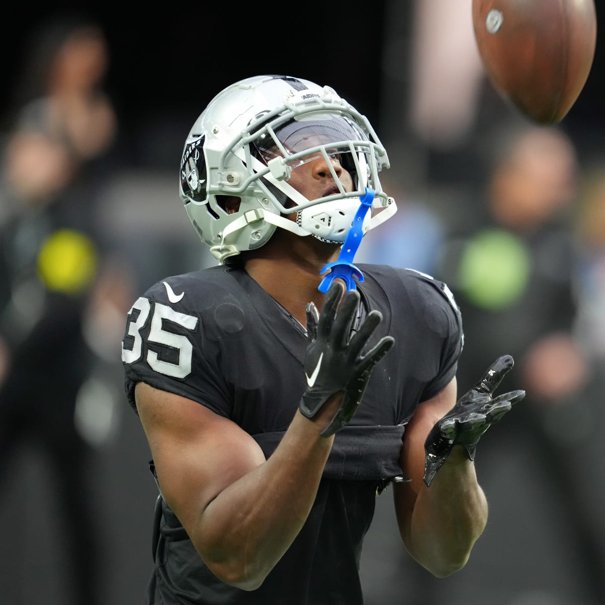 Las Vegas Raiders running back Zamir White (35) leaves the field