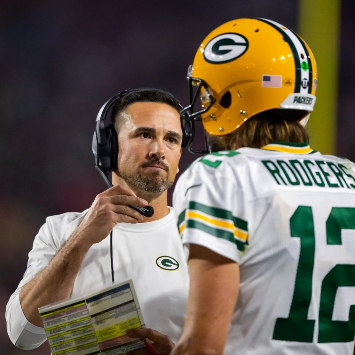 Aaron Rodgers shows off his new Matt LaFleur t-shirt