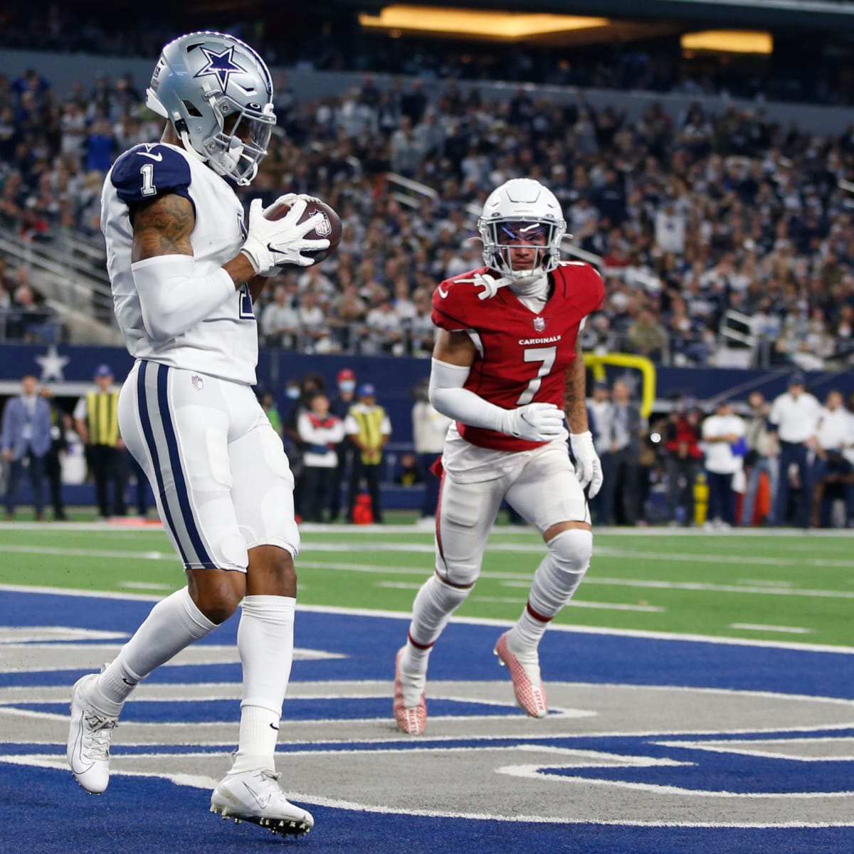 Wide receivers CeeDee Lamb and Ced Wilson of the Dallas Cowboys look in  2023