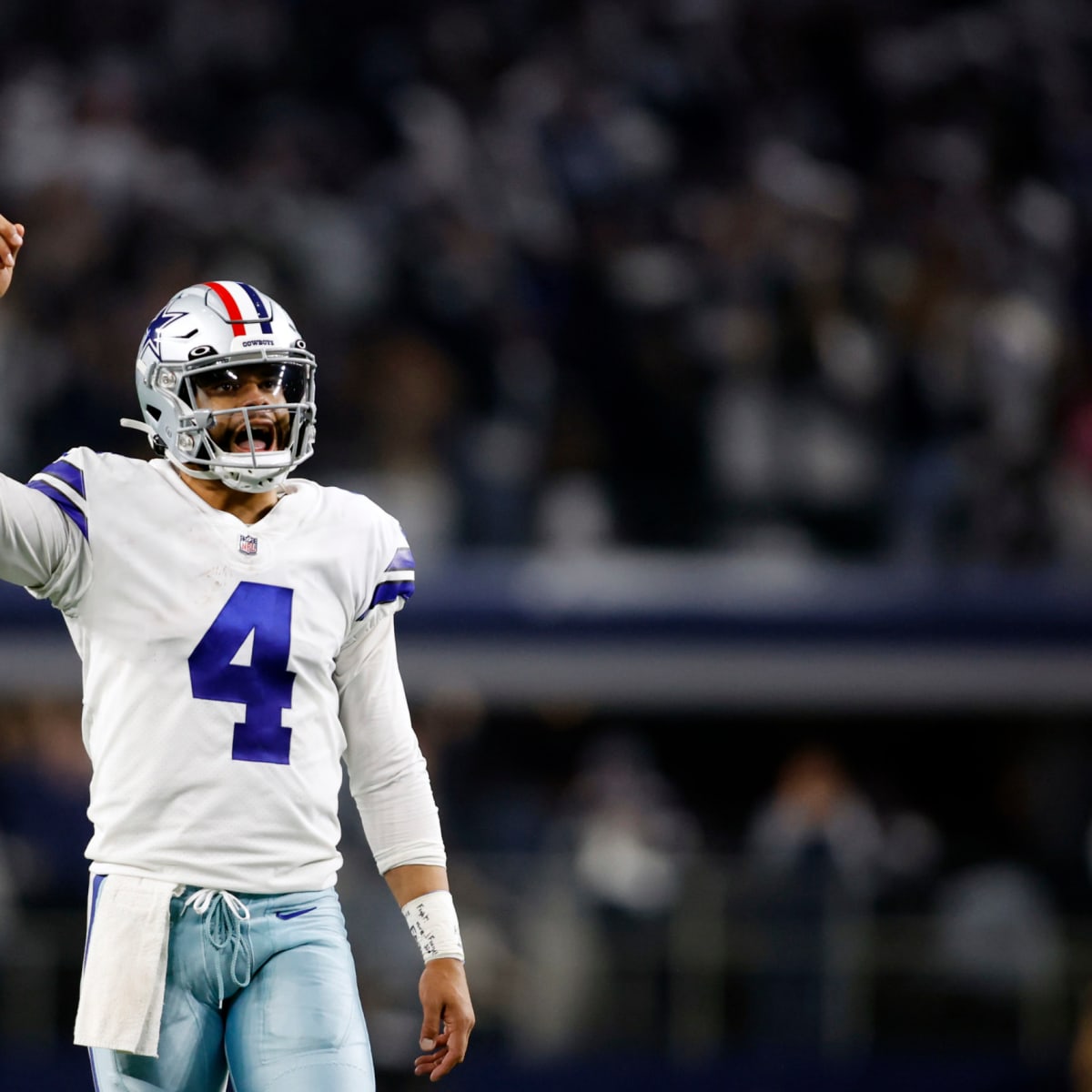 Dak Prescott receiving the 2016 NFL Offensive Rookie of the Year award. 