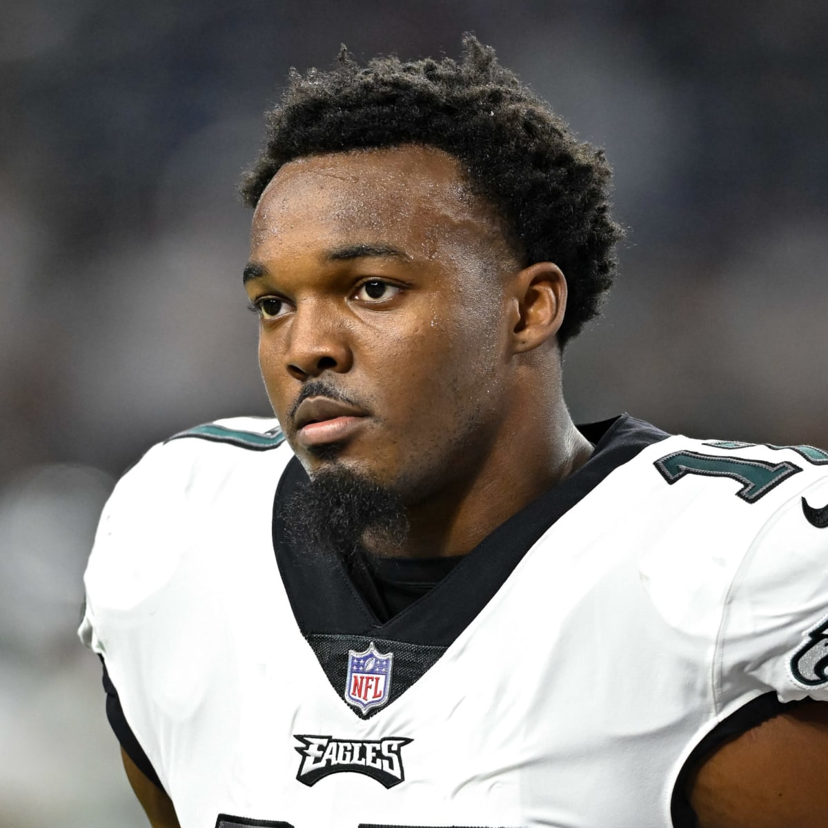 Eagles linebacker Kyzir White goes to bat for rookie Nakobe Dean