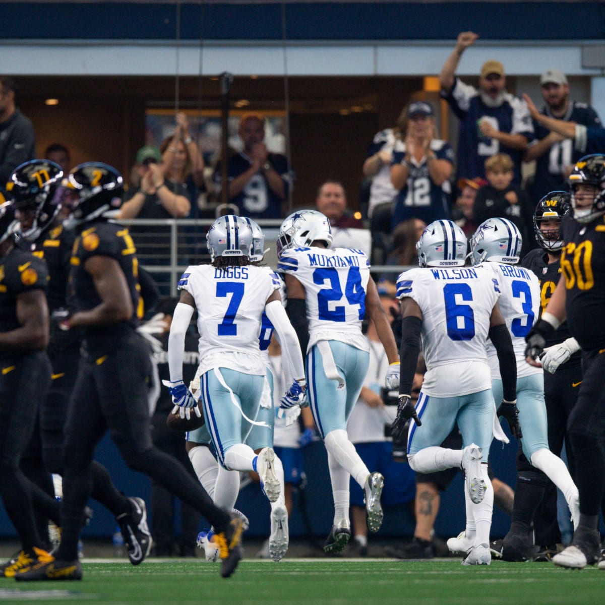 Dallas Cowboys safety Donovan Wilson (6) runs out onto the field