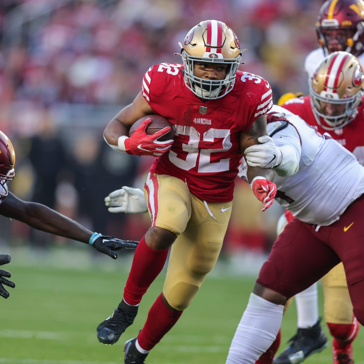 San Francisco 49ers' Jordan Mason takes part in drills at the NFL