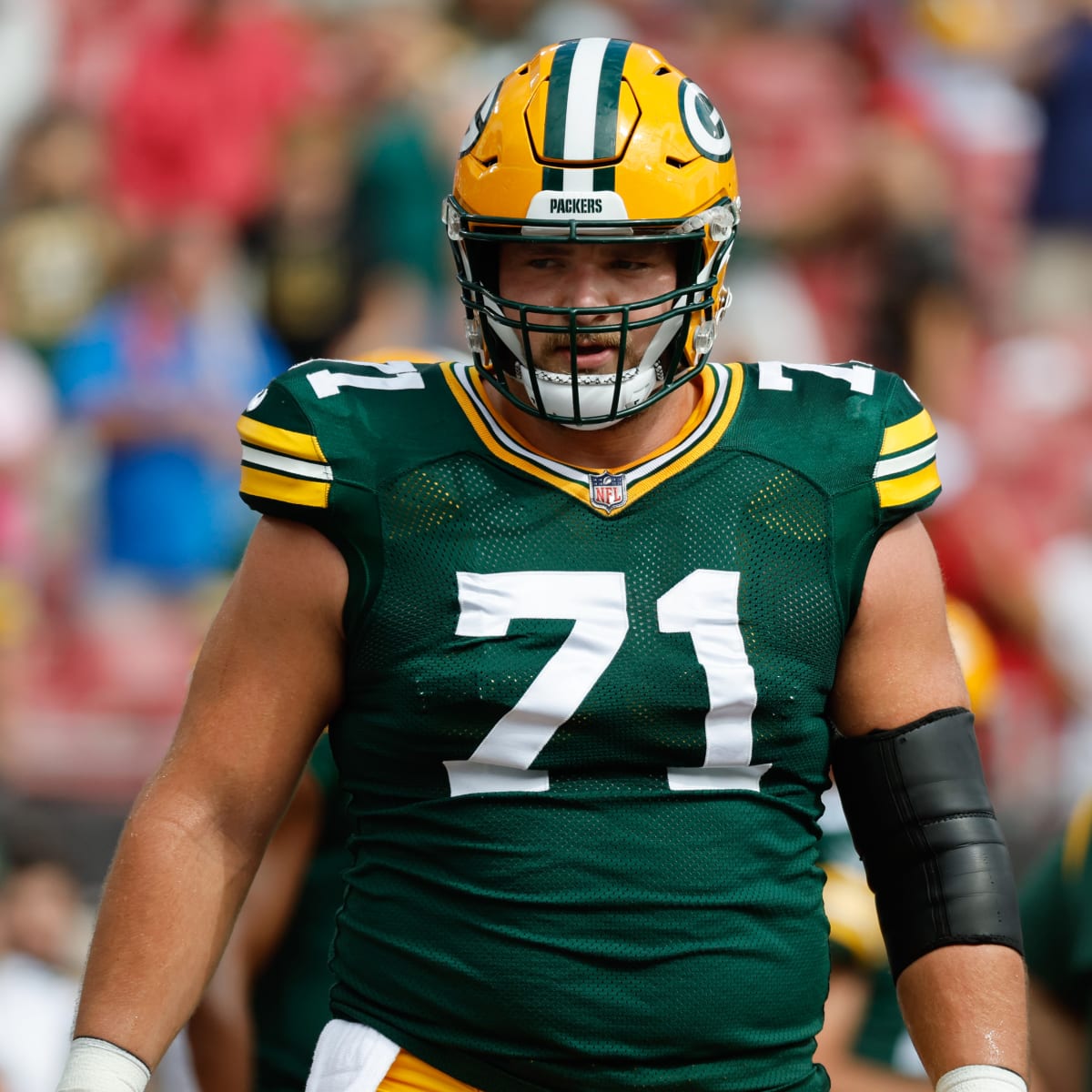 Green Bay Packers guard Zach Tom (50) lines up during an NFL