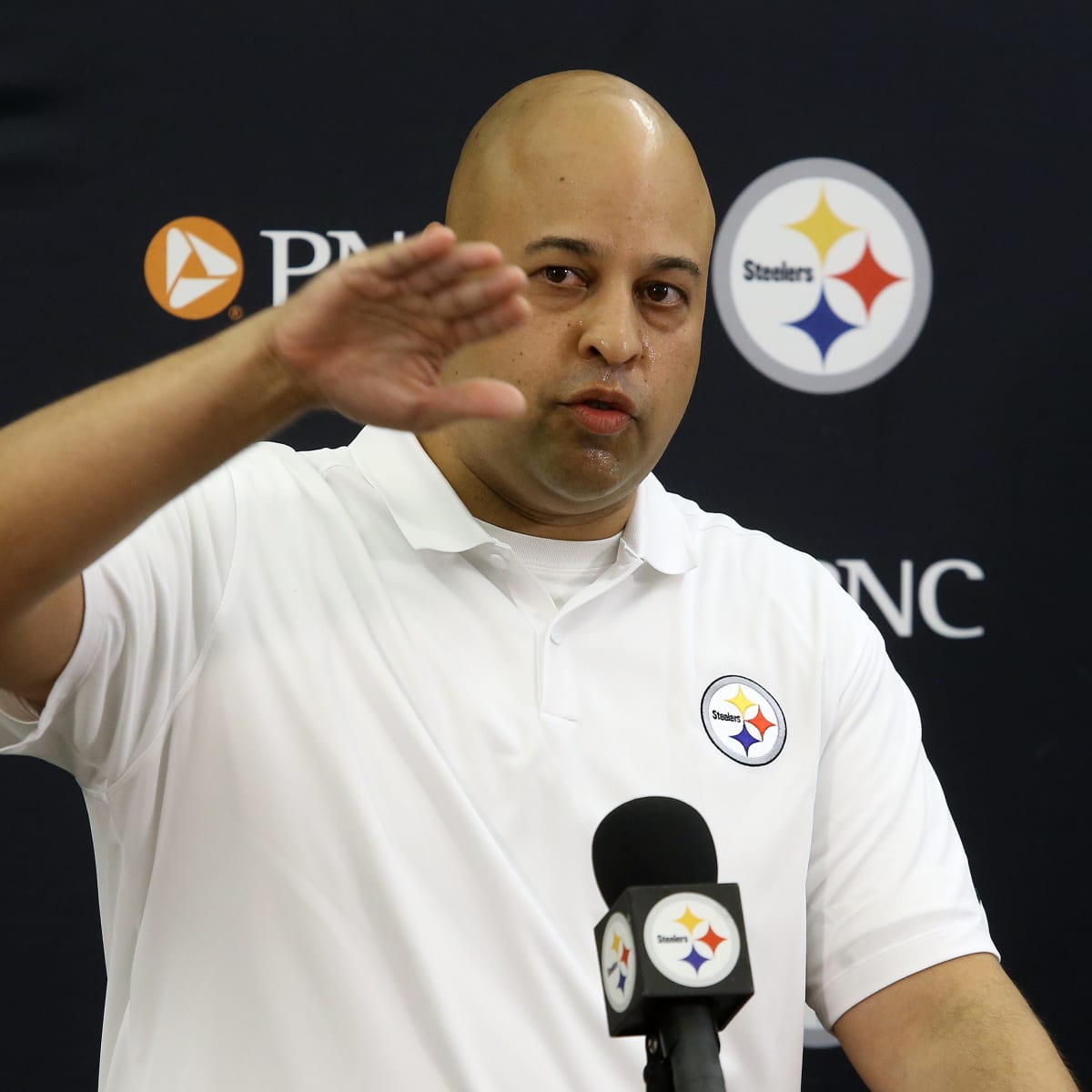 Pittsburgh Steelers General Manager Omar Khan watches the team go through  drills during practice at NFL football training camp in the Latrobe  Memorial Stadium in Latrobe, Pa., Monday, Aug. 8, 2022. (AP