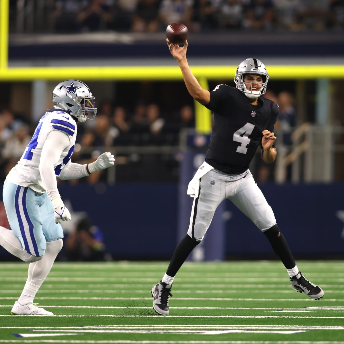 Las Vegas Raiders quarterback Aidan O'Connell (4) gestures as he