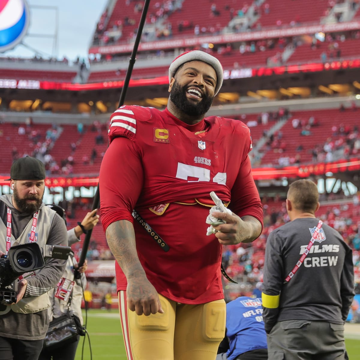 New yearly cap hits revealed in restructured contracts for 49ers' George  Kittle, Trent Williams