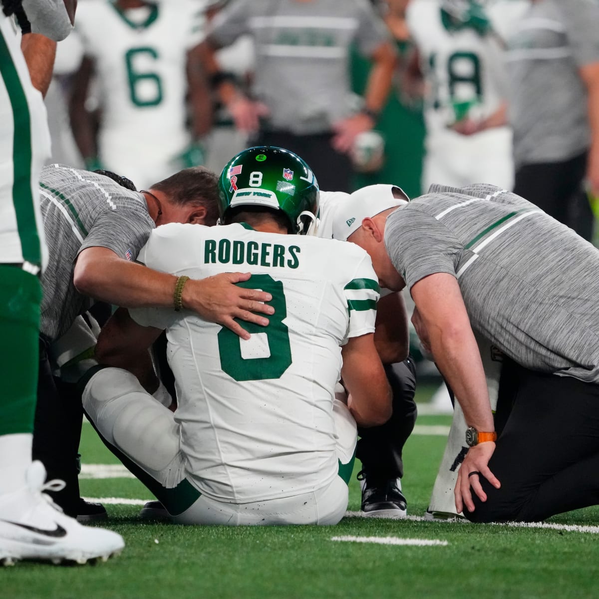 Aaron Rodgers hurts ankle in first series for Jets, is carted off sideline  and ruled out of game