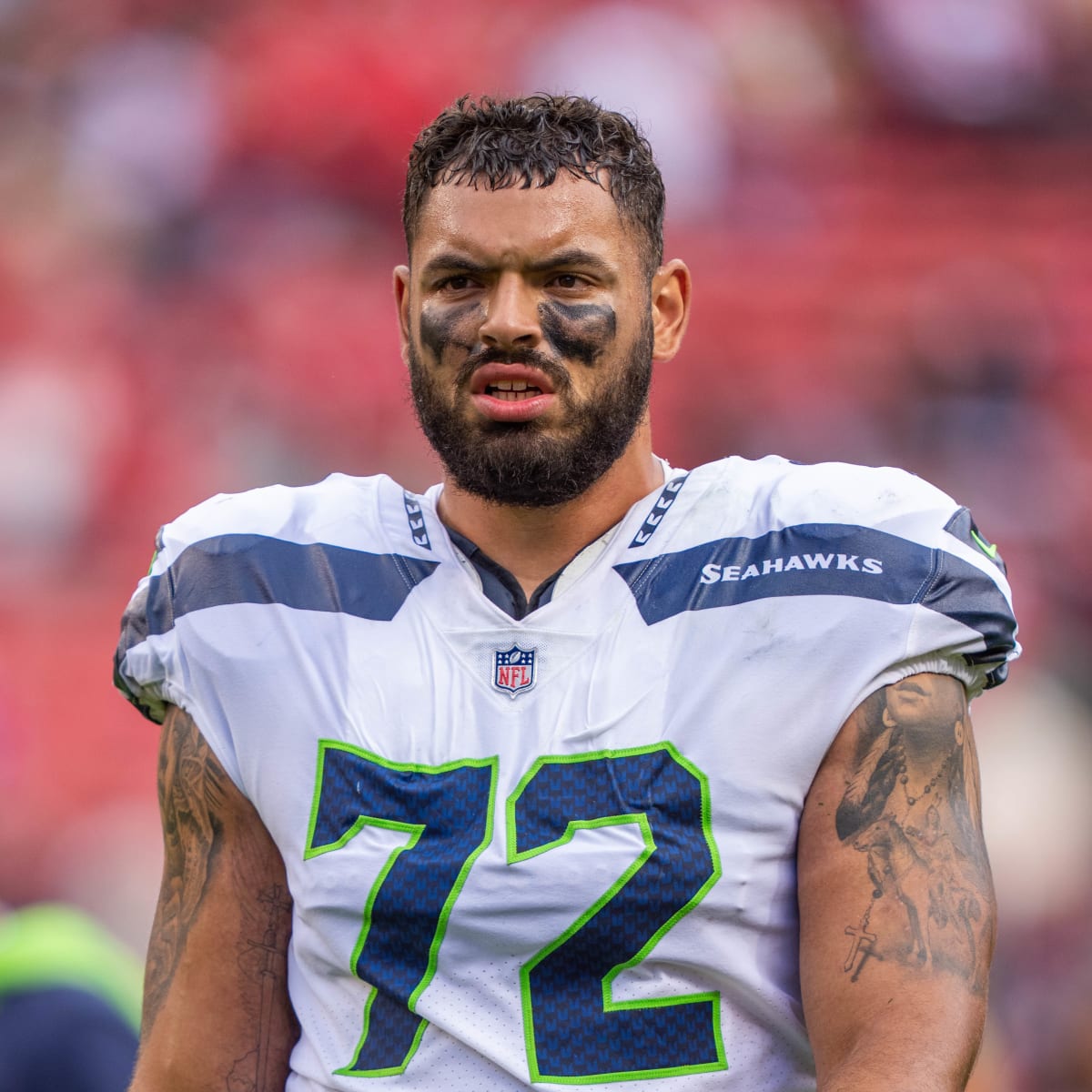 Seattle Seahawks offensive tackle Abraham Lucas (72) gets set