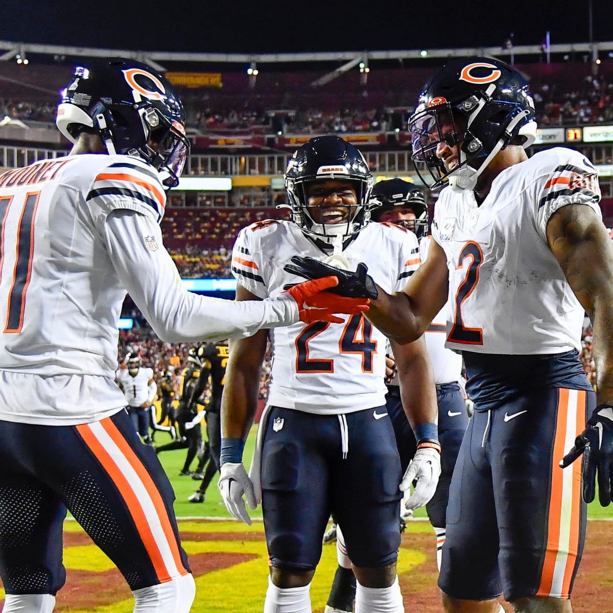 Chicago Bears quarterback Justin Fields runs against the Washington  Commanders in the first half of an NFL football game in Chicago, Thursday,  Oct. 13, 2022. (AP Photo/Nam Y. Huh Stock Photo - Alamy