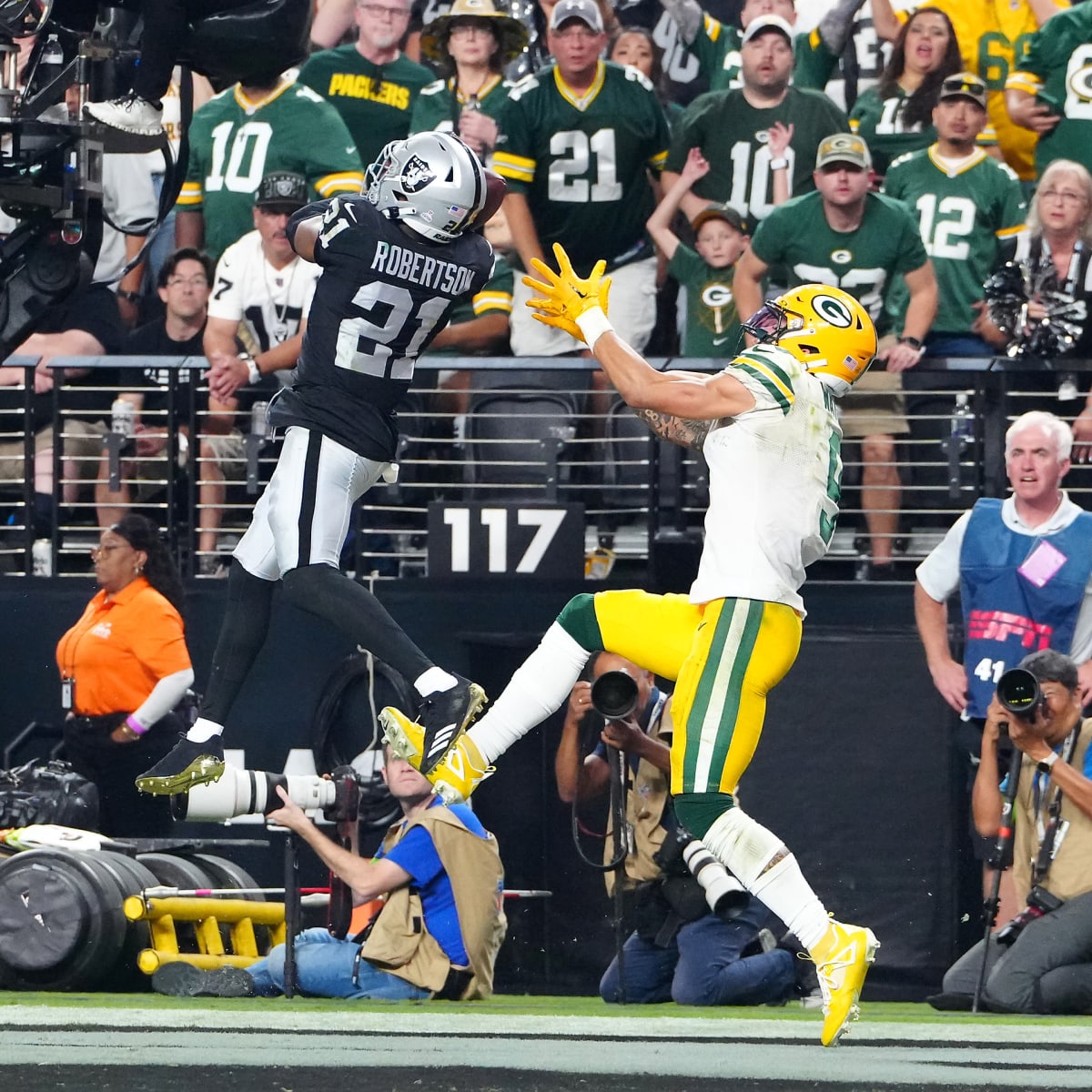 Raiders cornerback Amik Robertson (21) reacts to an early hit