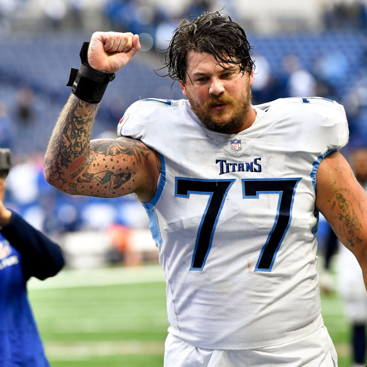 Titans LT Taylor Lewan Celebrates Contract Extension in Style