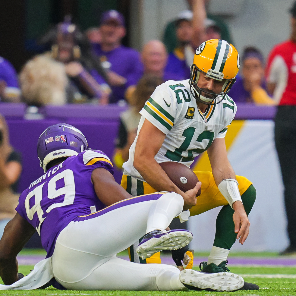 A few fans misbehave at cold Packers-Vikings game