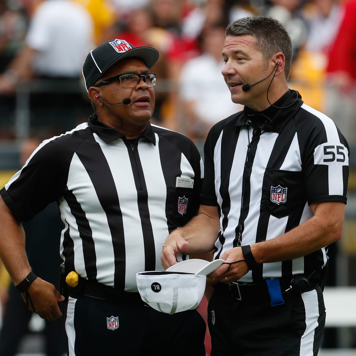 Why do referees throw their hats online