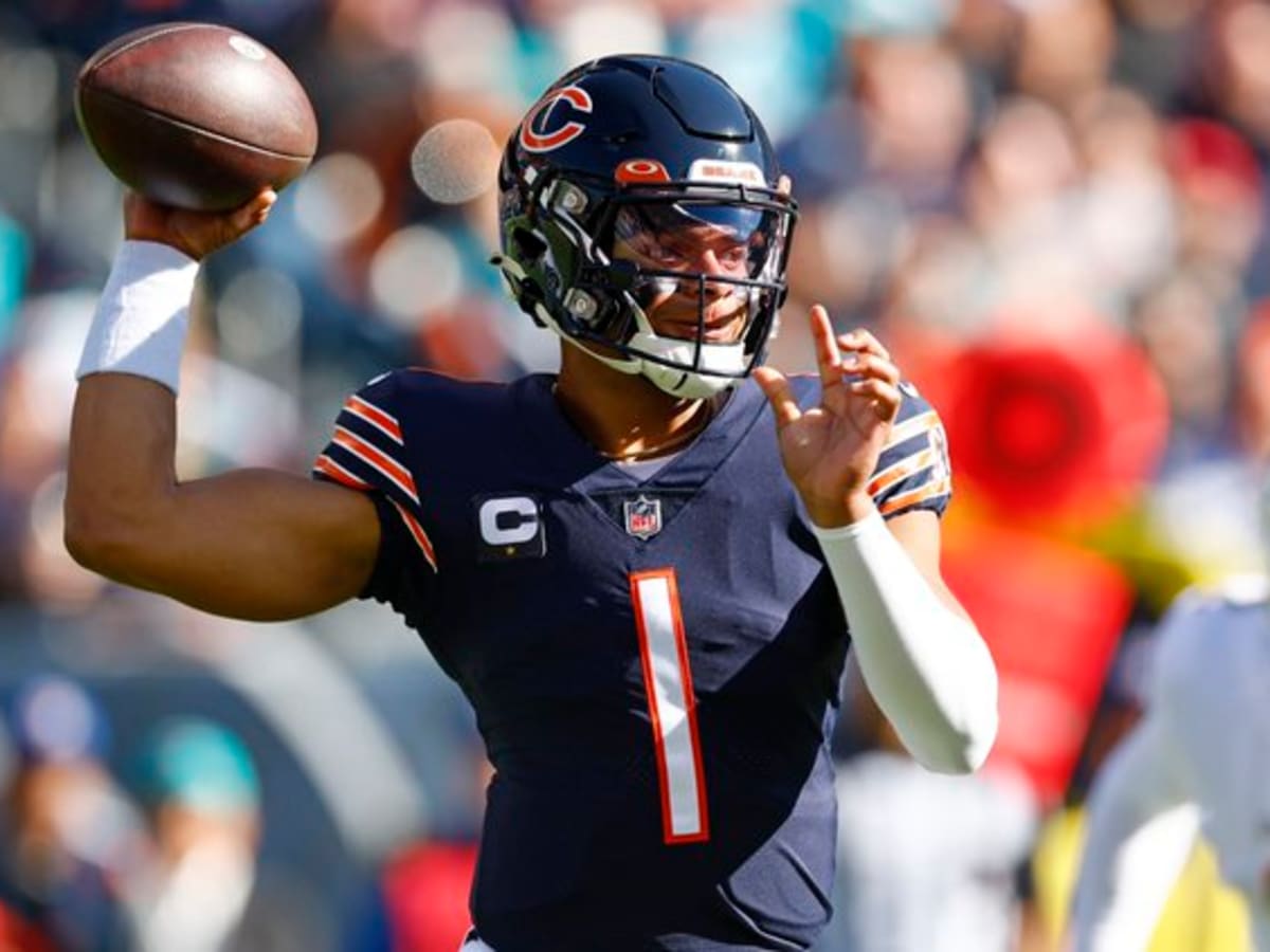 Tua, Dolphins outlast Bears on Fields' record rushing day