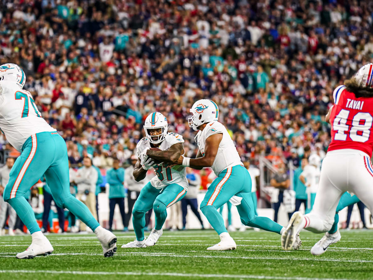 HOUSTON, TX - AUGUST 19: Miami Dolphins offensive tackle Isaiah Wynn (77)  prepares to pass block