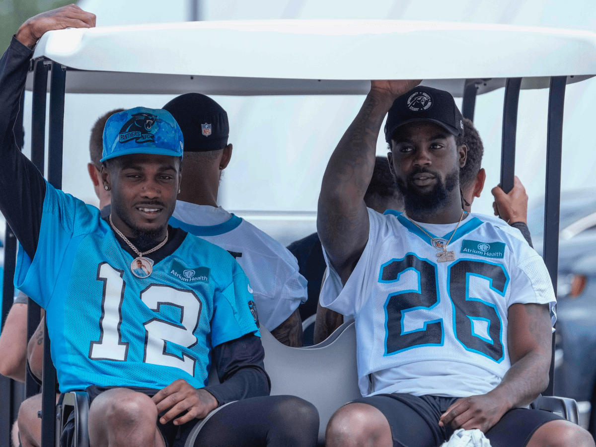 Panthers players exchange trash talk with Cowboys fan at training camp