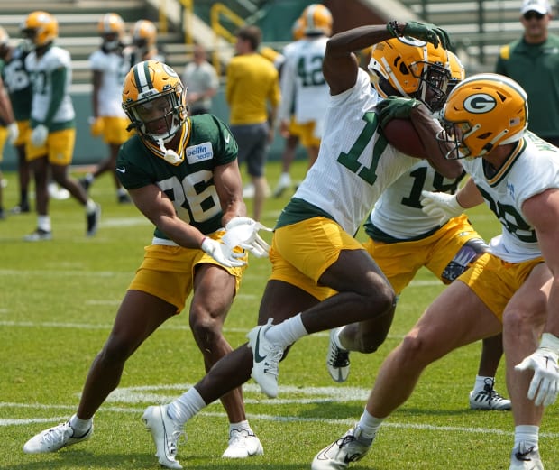 ASHWAUBENON, WI - JULY 31: Green Bay Packers safety Darnell Savage Jr.,  (26) laughs during 2021 Training Camp at Ray Nitschke Field on July 31,  2021 in Ashwaubenon, WI. (Photo by Larry