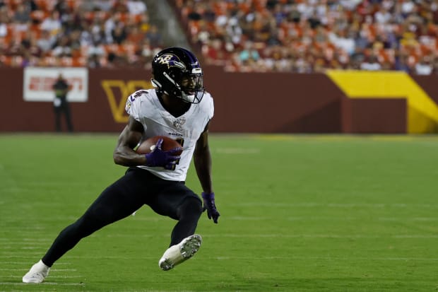 Baltimore Ravens linebacker Tavius Robinson (95) runs during an NFL  preseason football game against the Washington Commanders, Monday, August  21, 2023 in Landover. (AP Photo/Daniel Kucin Jr Stock Photo - Alamy