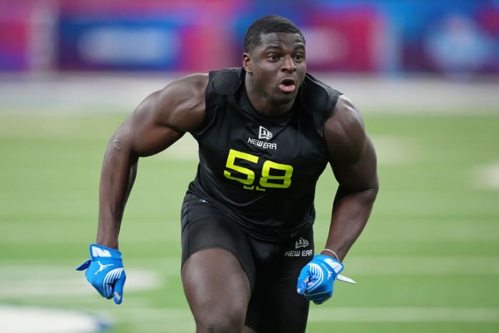 Feb 27, 2025; Indianapolis, IN, USA; UCLA defensive lineman Oluwafemi Oladejo (DL58) participates in drills during the 2025 NFL Combine at Lucas Oil Stadium.