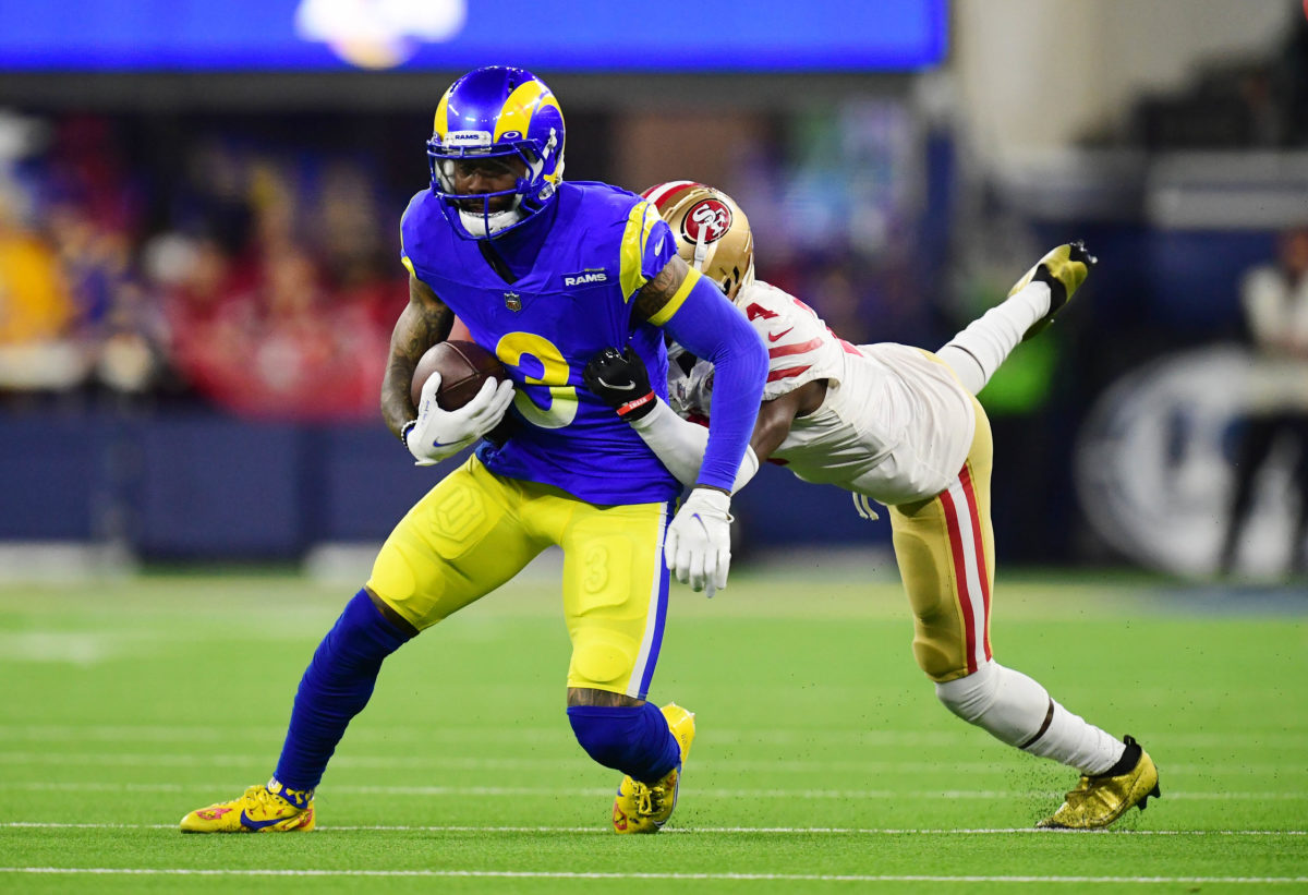 Jan 30, 2022; Inglewood, California, USA; Los Angeles Rams wide receiver Odell Beckham Jr. (3) is tackled by San Francisco 49ers cornerback Emmanuel Moseley (4) in the fourth quarter during the NFC Championship Game at SoFi Stadium. Mandatory Credit: Gary A. Vasquez-USA TODAY Sports - Aaron Rodgers