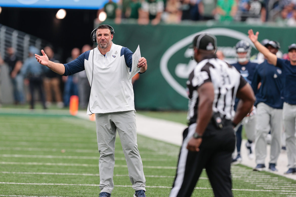 Tennessee Titans coach Mike Vrabel walks out of Friday's press conference