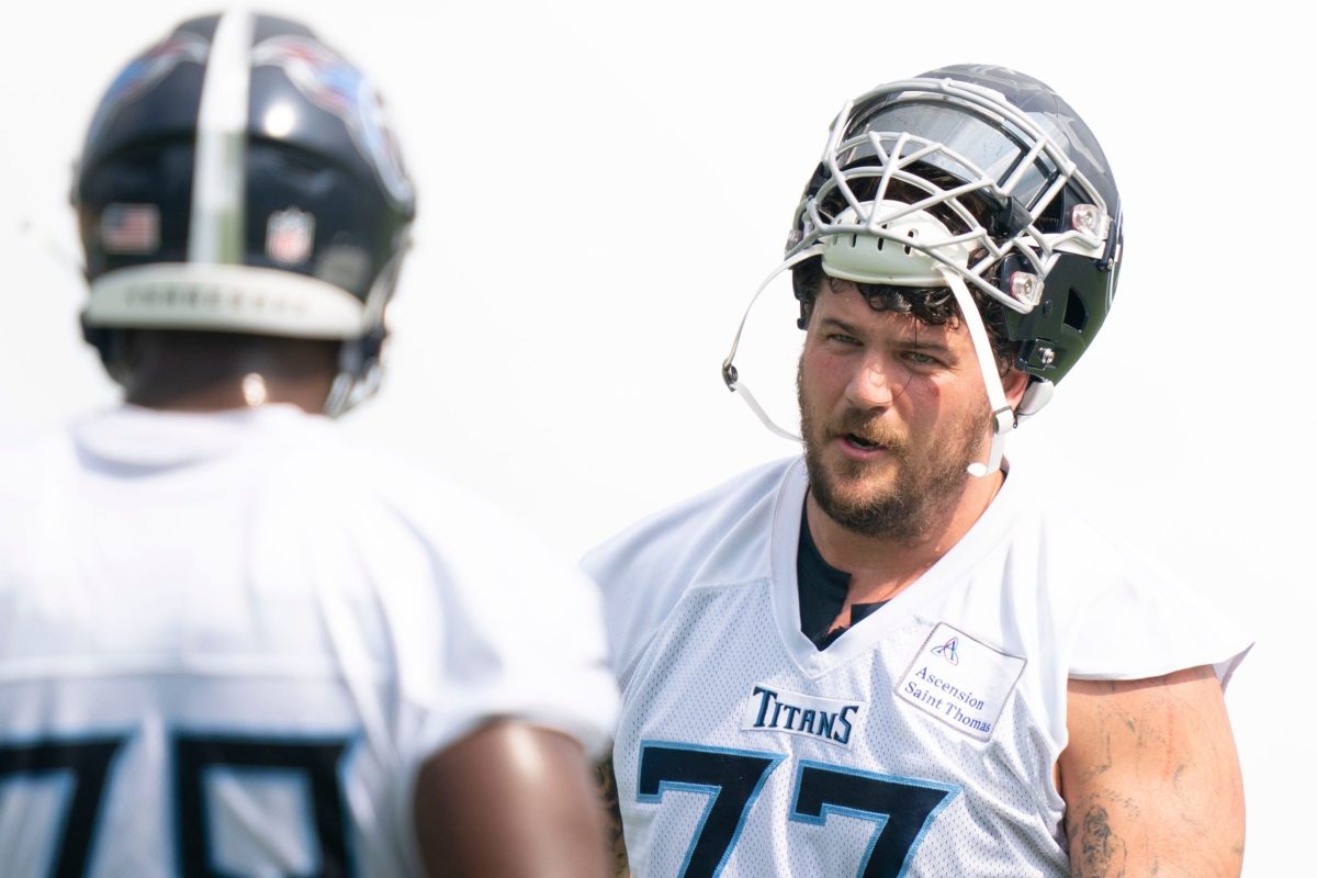 Orlando, Florida, USA. 27th Jan, 2019. AFC offensive tackle Taylor Lewan  (77), of the Tennessee Titans, and AFC punter Brett Kern (6), of the Tennessee  Titans, during the NFL Pro Bowl football