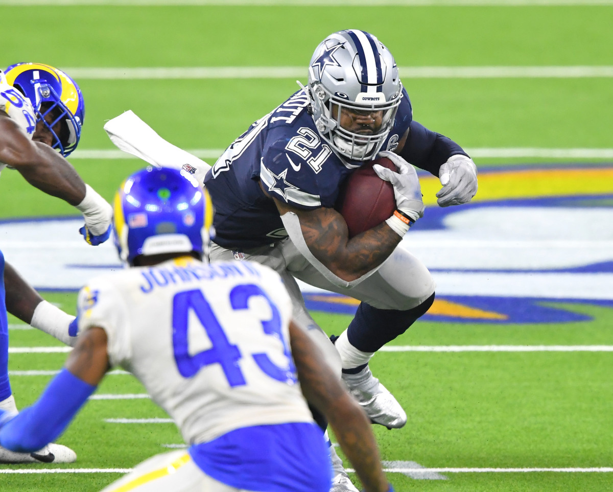 Cowboys restructure Dak Prescott, Zack Martin contracts to create roughly  $22M in cap space