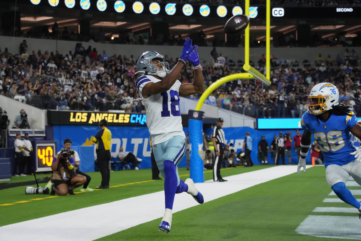 Dallas Cowboys wide receiver Jalen Tolbert (18) makes a touchdown