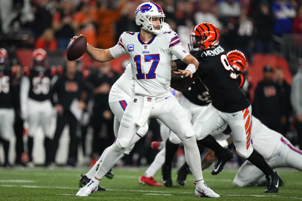 Josh Allen wearing a Bills Ryan Fitzpatrick jersey during pregame