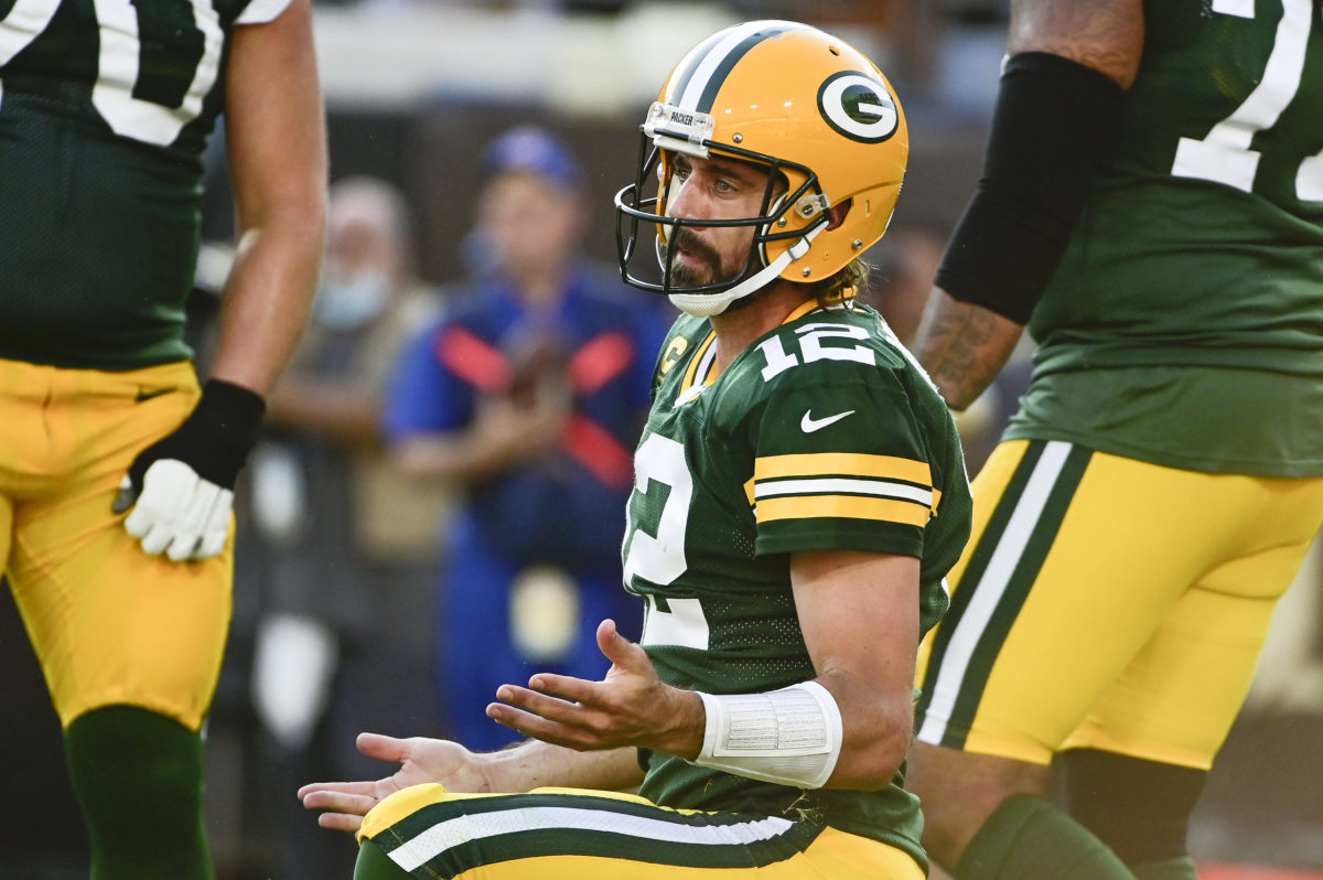 Green Bay Packers quarterback Aaron Rodgers is sacked by Seattle