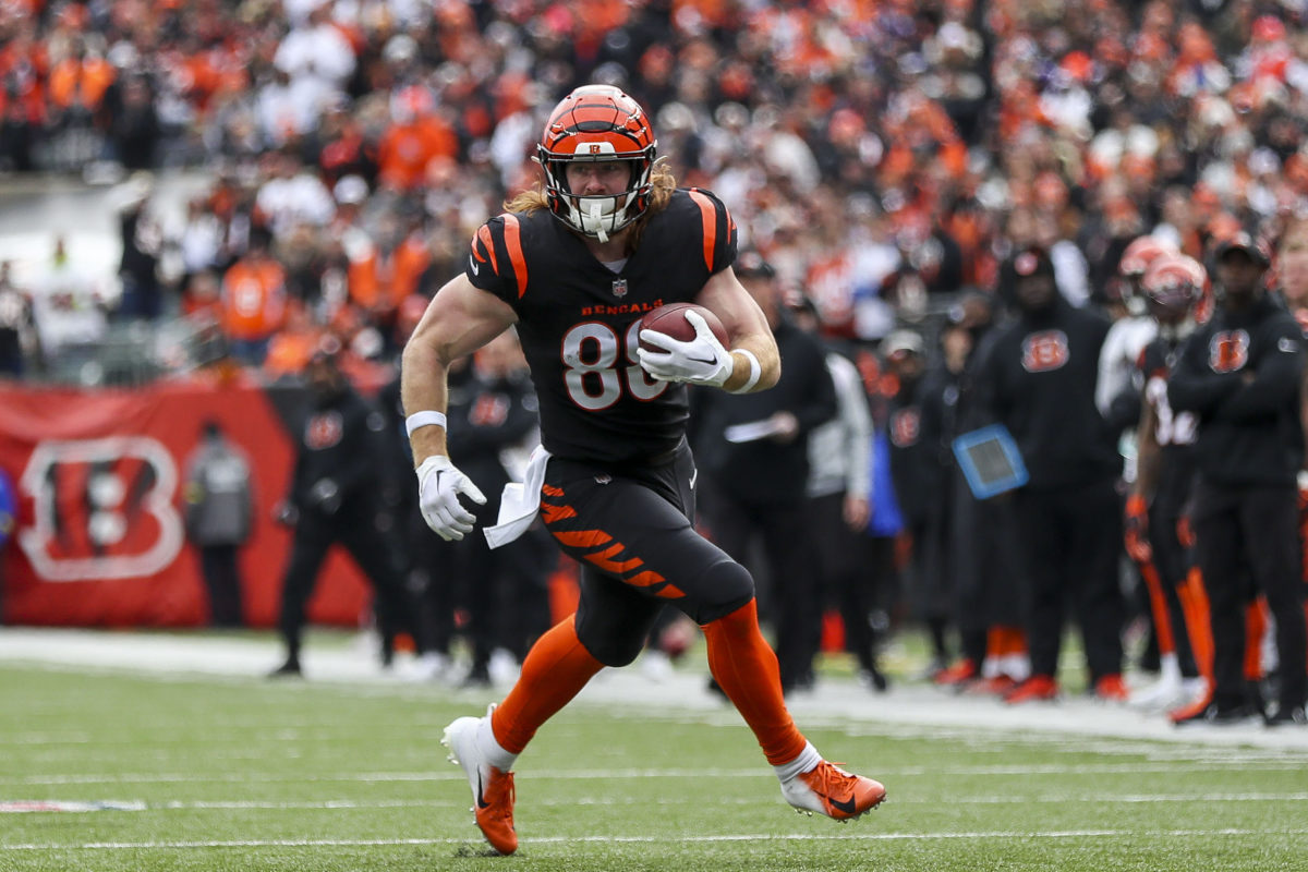 Cincinnati Bengals tight end Hayden Hurst (88) runs after making a