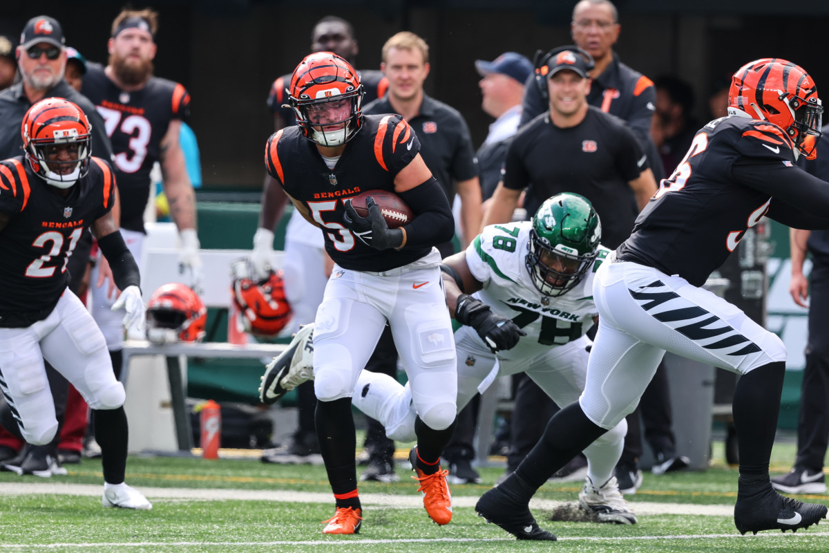 Cincinnati Bengals linebacker Logan Wilson (55) runs for the play during an  NFL wild-card football game against the Baltimore Ravens on Sunday, Jan.  15, 2023, in Cincinnati. (AP Photo/Emilee Chinn Stock Photo 