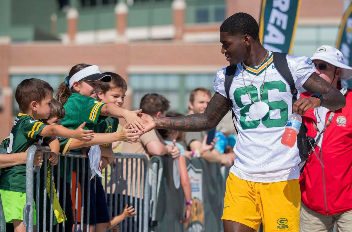 Top photos of Packers riding bikes to training camp practice