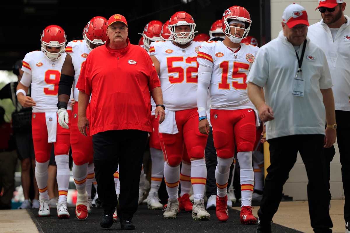 Kansas City Chiefs head coach Andy Reid leads his team through the tunnel onto the field.