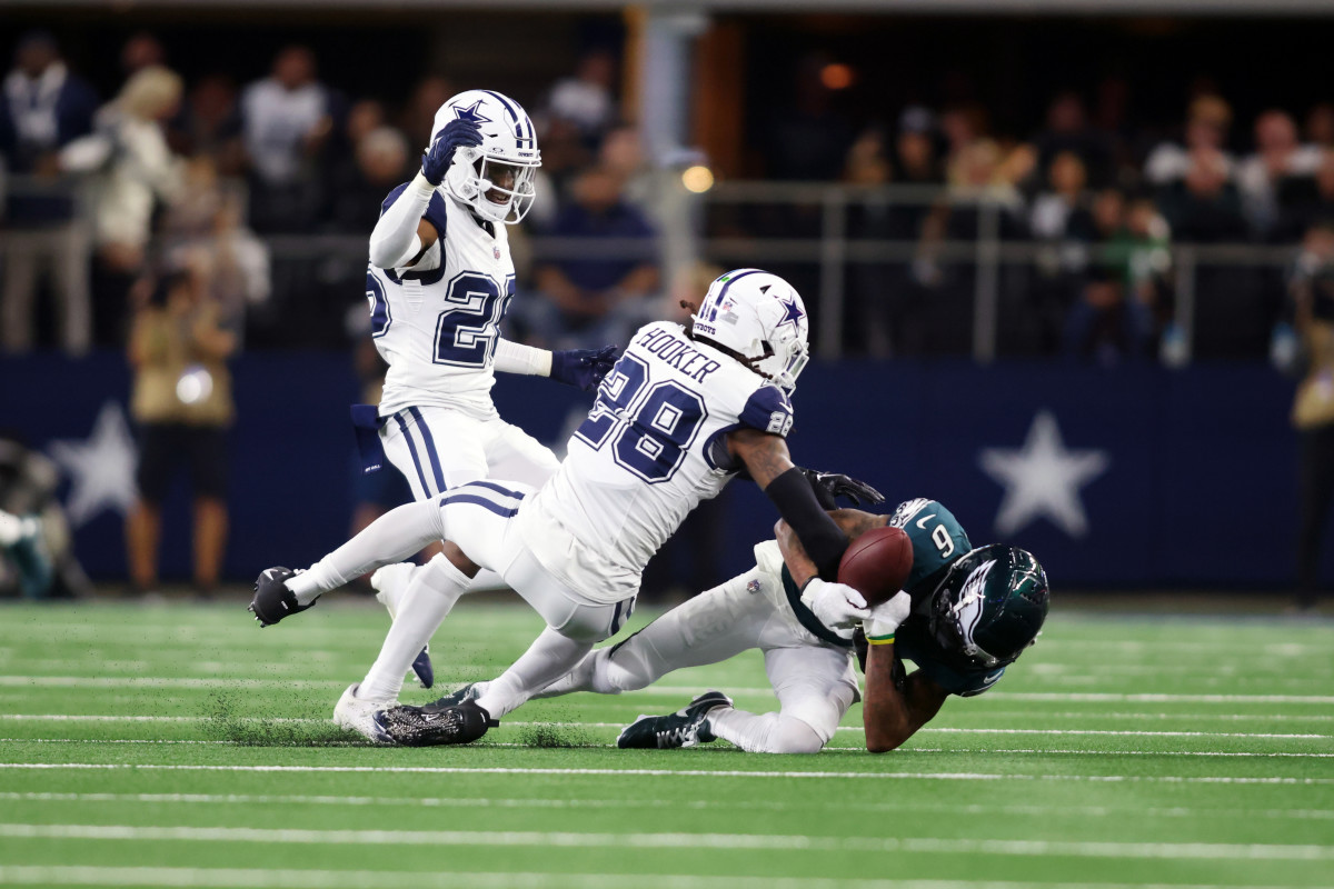 Philadelphia Eagles wide receiver DeVonta Smith (6) cannot catch a pass while defended by Dallas Cowboys safety Malik Hooker (28) in the second quarter at AT&T Stadium.