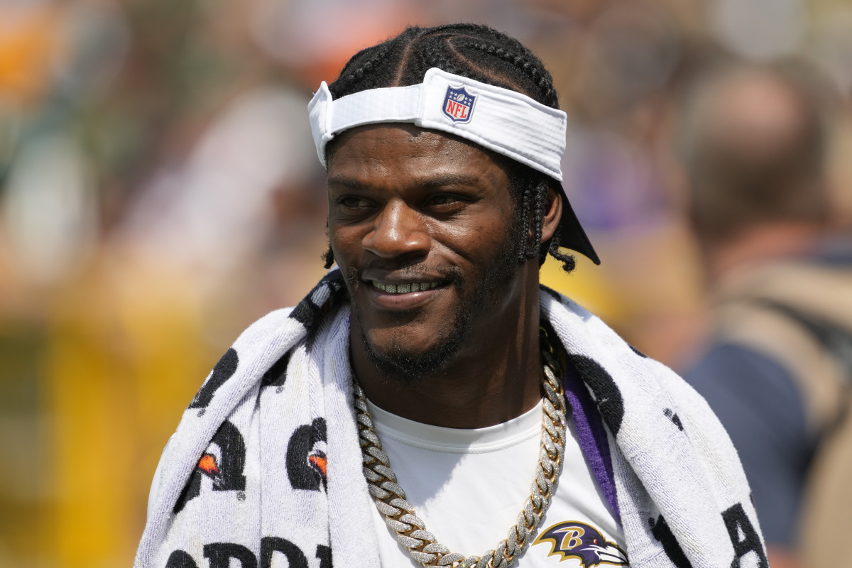 Aug 24, 2024; Green Bay, Wisconsin, USA; Baltimore Ravens quarterback Lamar Jackson walks to the locker room prior to halftime of the game against the Green Bay Packers at Lambeau Field. Mandatory Credit: Jeff Hanisch-USA TODAY Sports