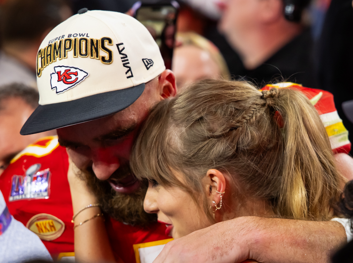 Feb 11, 2024; Paradise, Nevada, USA; Kansas City Chiefs tight end Travis Kelce (87) celebrates with girlfriend Taylor Swift after defeating the San Francisco 49ers in Super Bowl LVIII at Allegiant Stadium. 