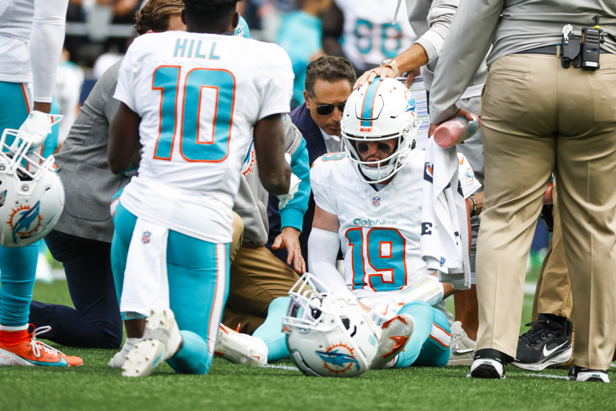 Sep 22, 2024; Seattle, Washington, USA; Miami Dolphins quarterback Skylar Thompson (19) receives medical attention after suffering an injury during the third quarter against the Seattle Seahawks at Lumen Field.