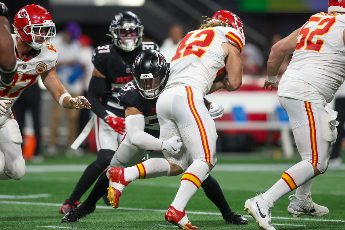 Sep 22, 2024; Atlanta, Georgia, USA; Atlanta Falcons linebacker Kaden Elliss (55) tackles Kansas City Chiefs running back Carson Steele (42) in the second quarter at Mercedes-Benz Stadium.