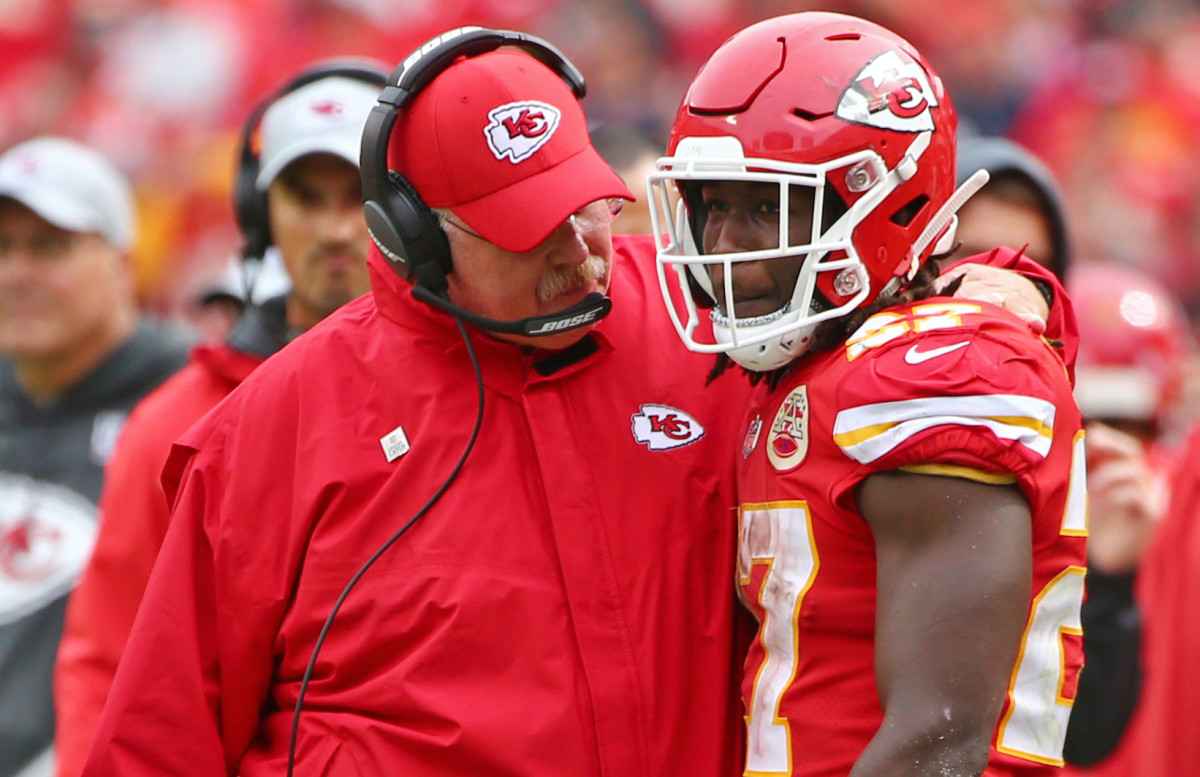 Oct 7, 2018; Kansas City, MO, USA; Kansas City Chiefs head coach Andy Reid talks with running back Kareem Hunt (27) in the second half against the Jacksonville Jaguars at Arrowhead Stadium.