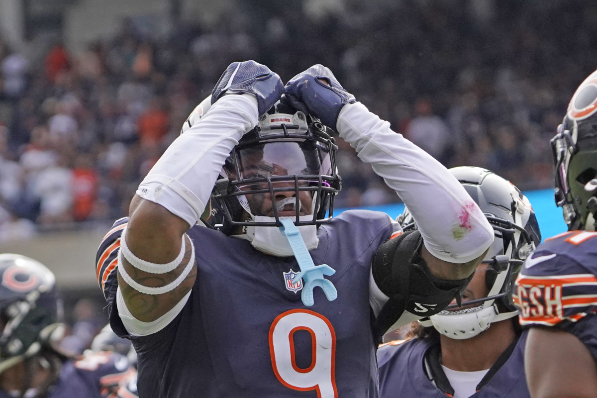 Sep 29, 2024; Chicago, Illinois, USA; Chicago Bears safety Jaquan Brisker (9) celebrates a defensive stop against the Los Angeles Rams during the second half at Soldier Field.