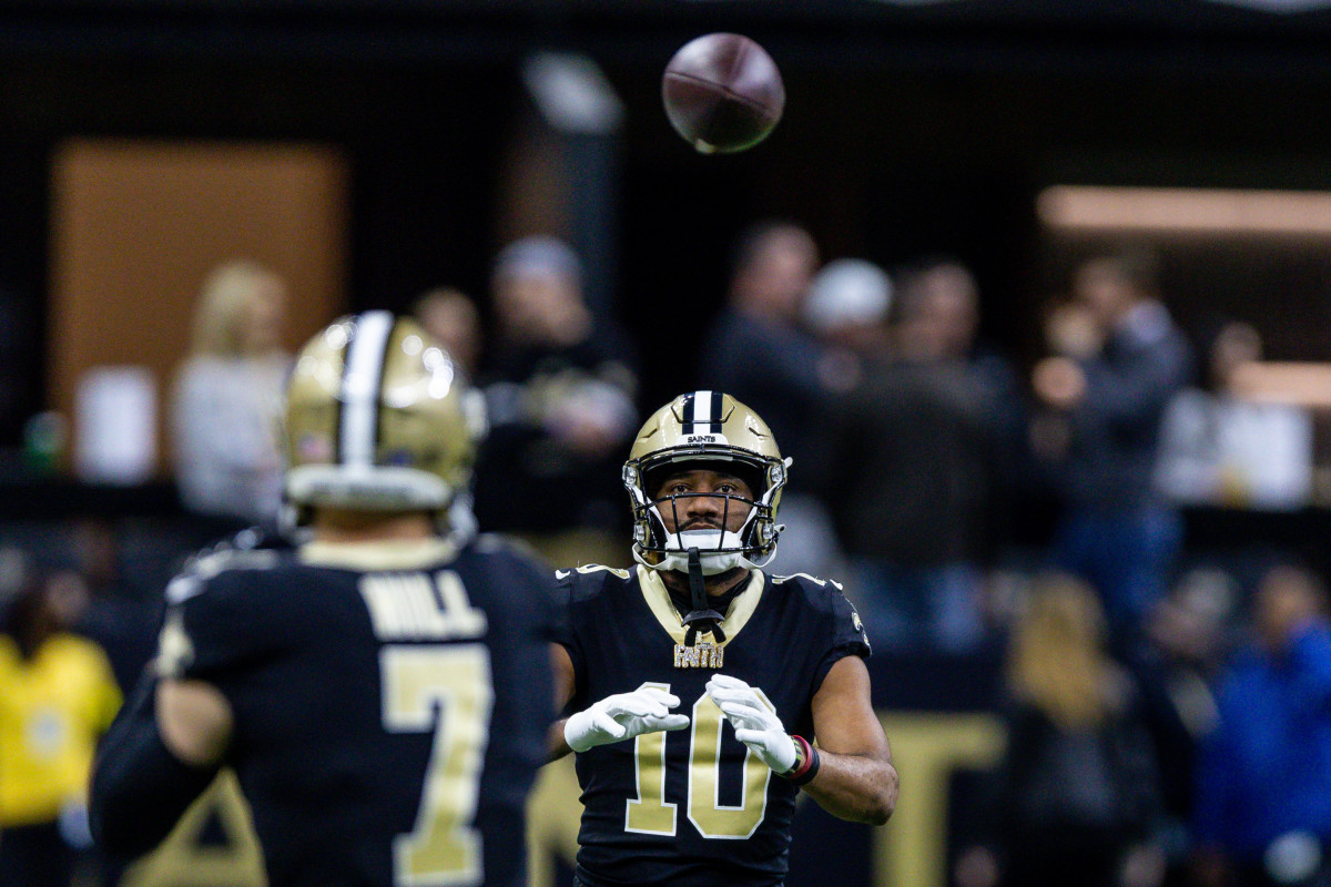 New Orleans Saints - That black helmet/color rush jersey combo 