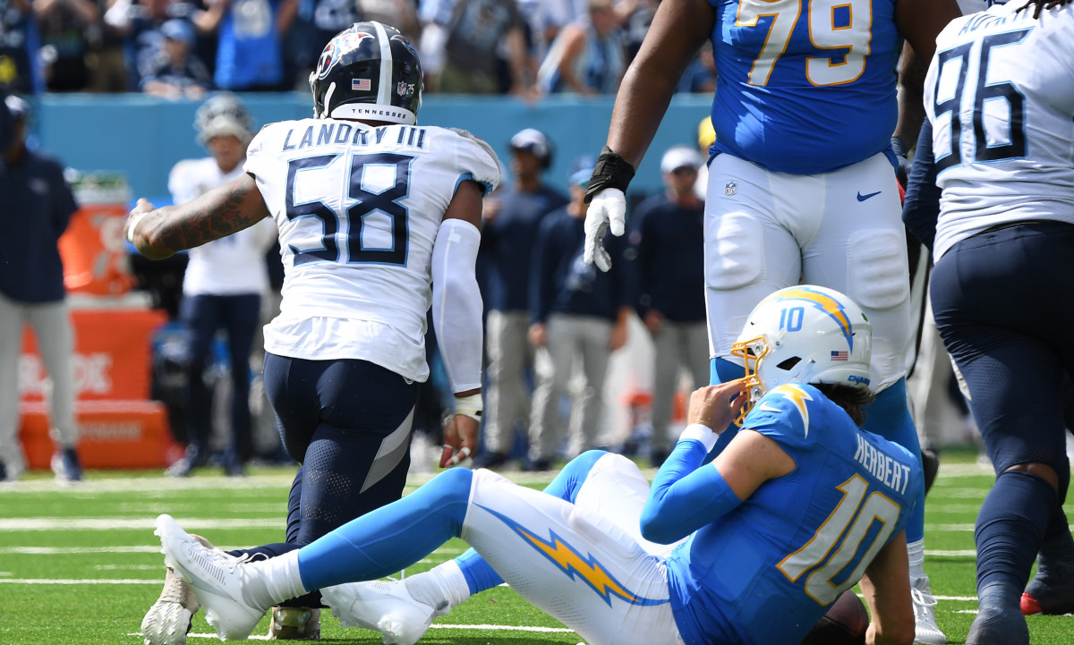 Tennessee Titans linebacker Harold Landry III (58) celebrates with  linebacker Chance Campbell (45) after Landry's sack on Los Angeles Chargers  quarterback Justin Herbert during the second half of an NFL football game