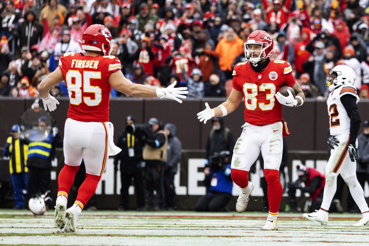 Dec 15, 2024; Cleveland, Ohio, USA; Kansas City Chiefs tight end Anthony Firkser (85) congratulates tight end Noah Gray (83) after a touchdown against the Cleveland Browns during the second quarter at Huntington Bank Field.