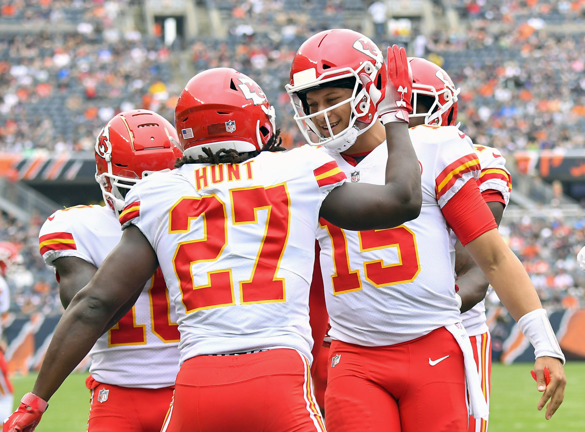 Kansas City Chiefs quarterback Patrick Mahomes (15) and running back Kareem Hunt (27) celebrate a touchdown.