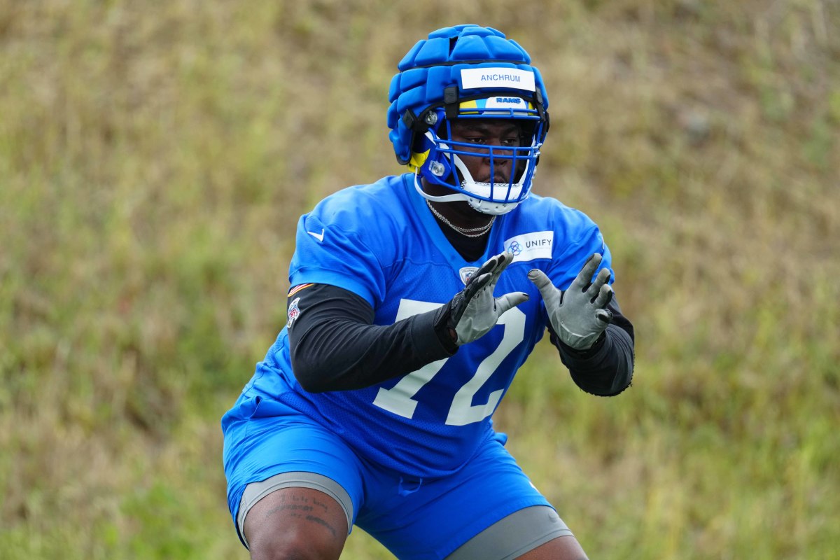 May 23, 2023, Thousand Oaks, CA, USA; Los Angeles Rams tackle Tremayne Anchrum Jr. (72) wears a Guardian cap on helmet during organized team activities at Cal Lutheran.