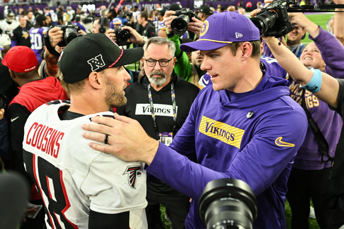 Dec 8, 2024; Minneapolis, Minnesota, USA; Atlanta Falcons quarterback Kirk Cousins (18) and Minnesota Vikings head coach Kevin O'Connell talk after the game at U.S. Bank Stadium.